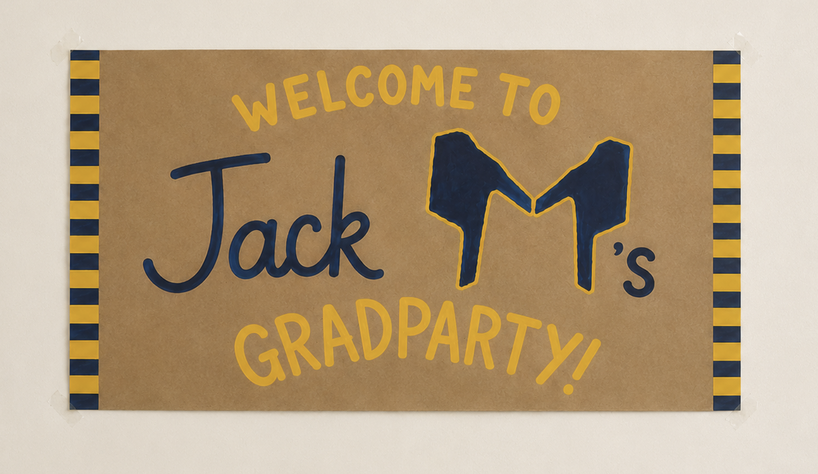 Hand-painted graduation party banner — Welcome to Jack M's Grad Party, Michigan colors